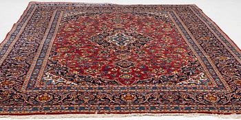 An oriental carpet, c. 340 x 240 cm.