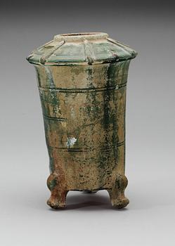 A green glazed pottery silo, Han dynasty (206 BC - 220 AD).