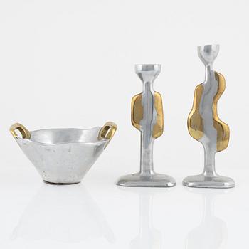 David Marshall, a metall and brass bowl and a pair of candle sticks.