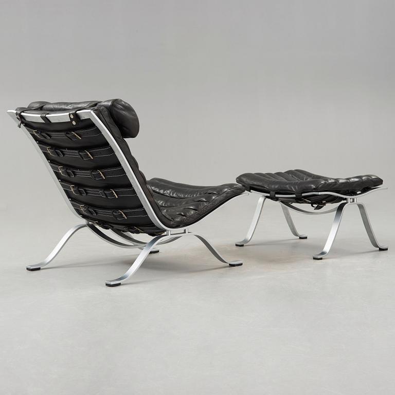 Arne Norell, an 'Ari' steel and black leather lounge chair with ottoman, Norell, Sweden.