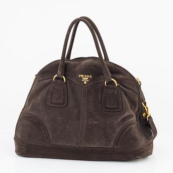 Prada, a chocolate brown suede handbag.