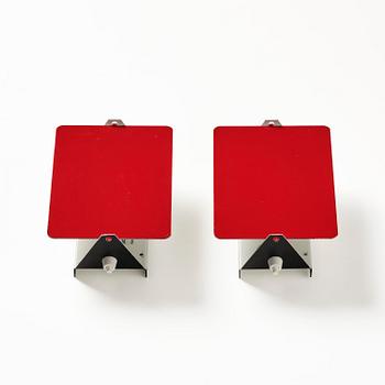 Charlotte Perriand, a pair of wall lights model "CP1", La Société Centrale d'Eclairage, France, 1960s.