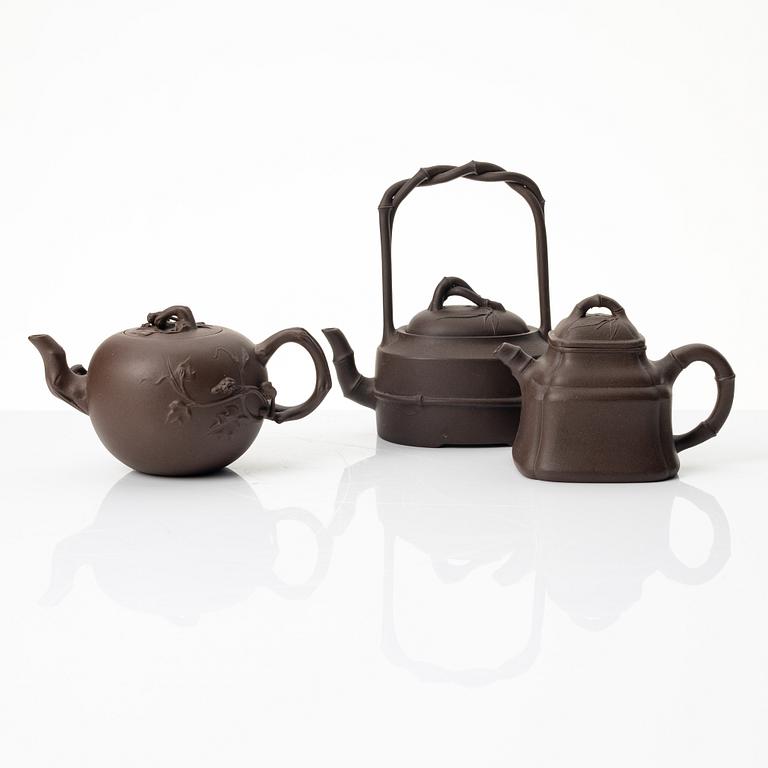A group of three Chinese yixing teapots, 1980s.