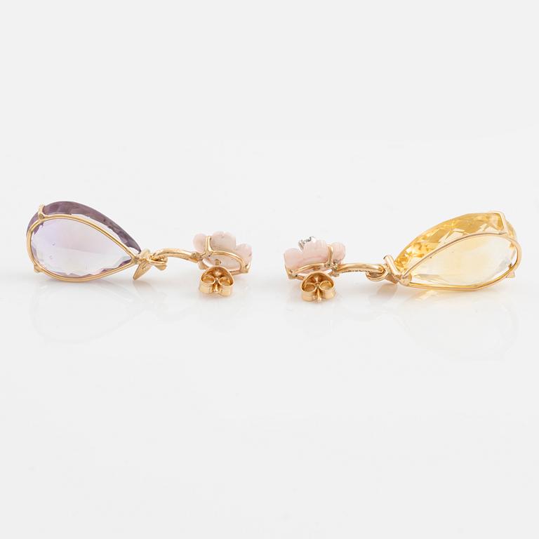 Earrings with drop-shaped checker-cut citrine and drop-shaped amethyst.