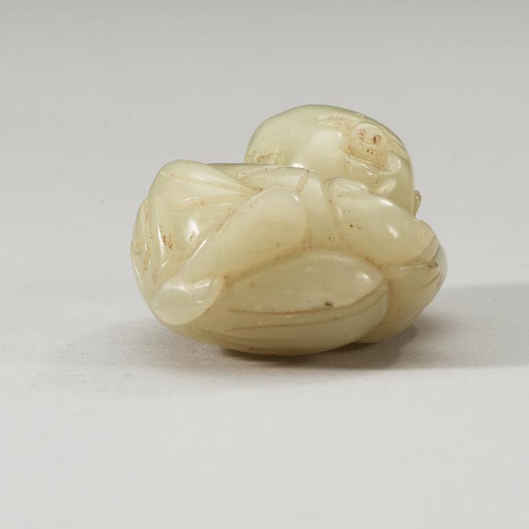 A Chinese nephrite figure of a boy.