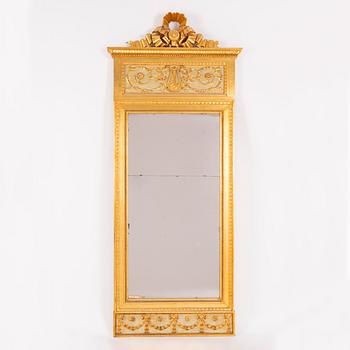 A late-Gustavian giltwood mirror, Stockholm, late 18th century.