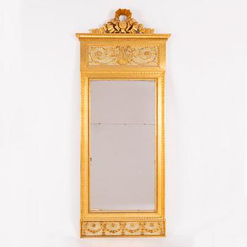 A late-Gustavian giltwood mirror, Stockholm, late 18th century.