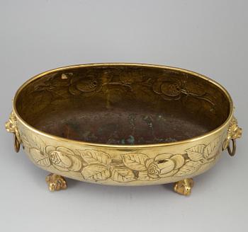 A 19th century brass flower pot.