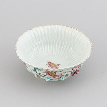 A famille rose relief moulded bowl, Qing dynasty, 18th century.