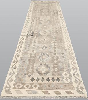 A Kilim runner, approx. 438 x 88 cm.