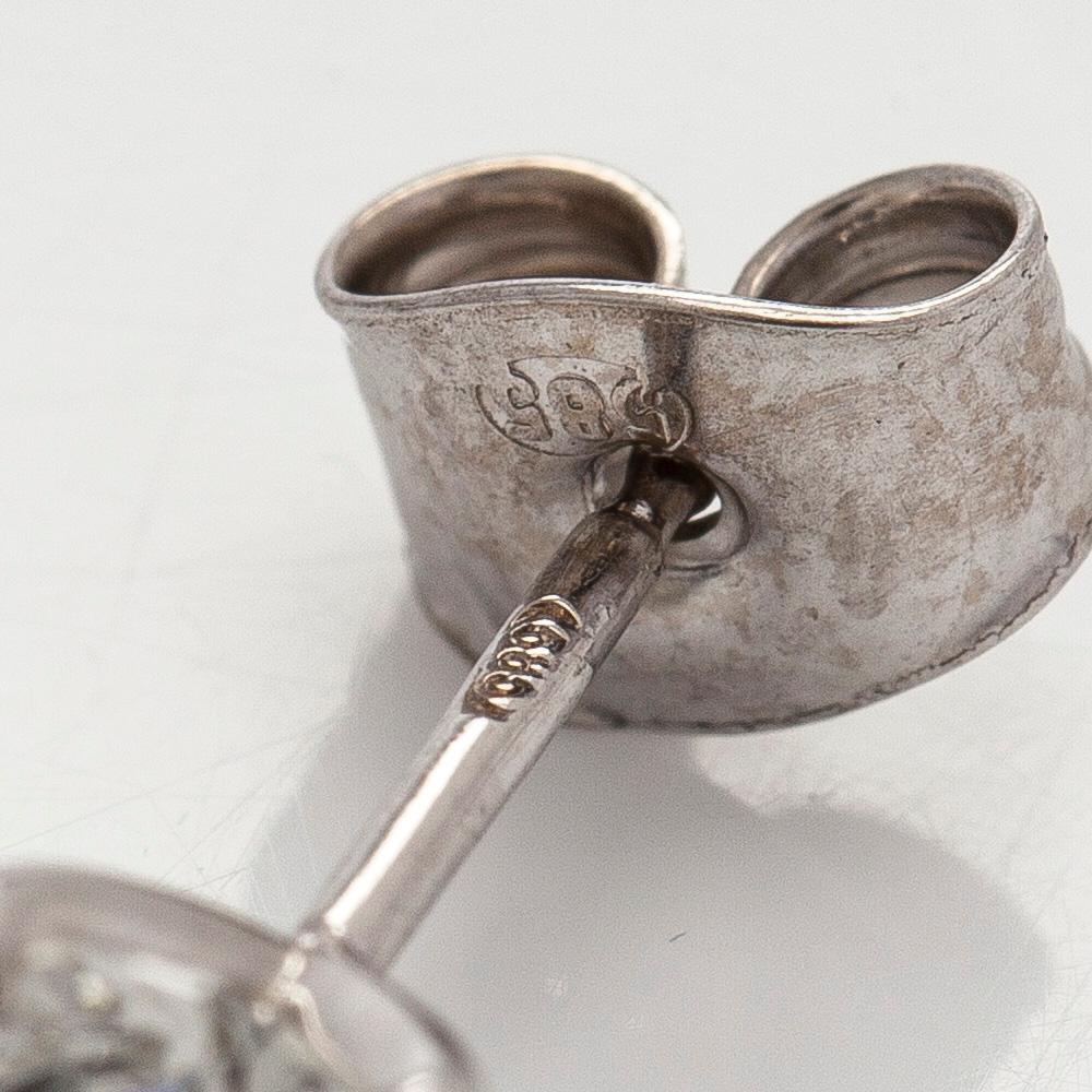 Korvakorut, briljanttihiotut timantit yhteensä 1,20 ct, 14K valkokultaa.