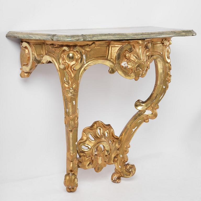 A rococo gilt-gesso and marble-top console table, Stockholm, later part 18th century.
