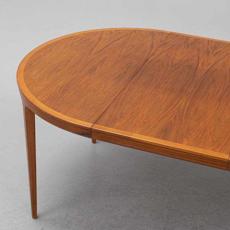Bertil Fridhagen, a 'Diamant' walnut veneered dining table, with four additional leaves.  Bodafors.
