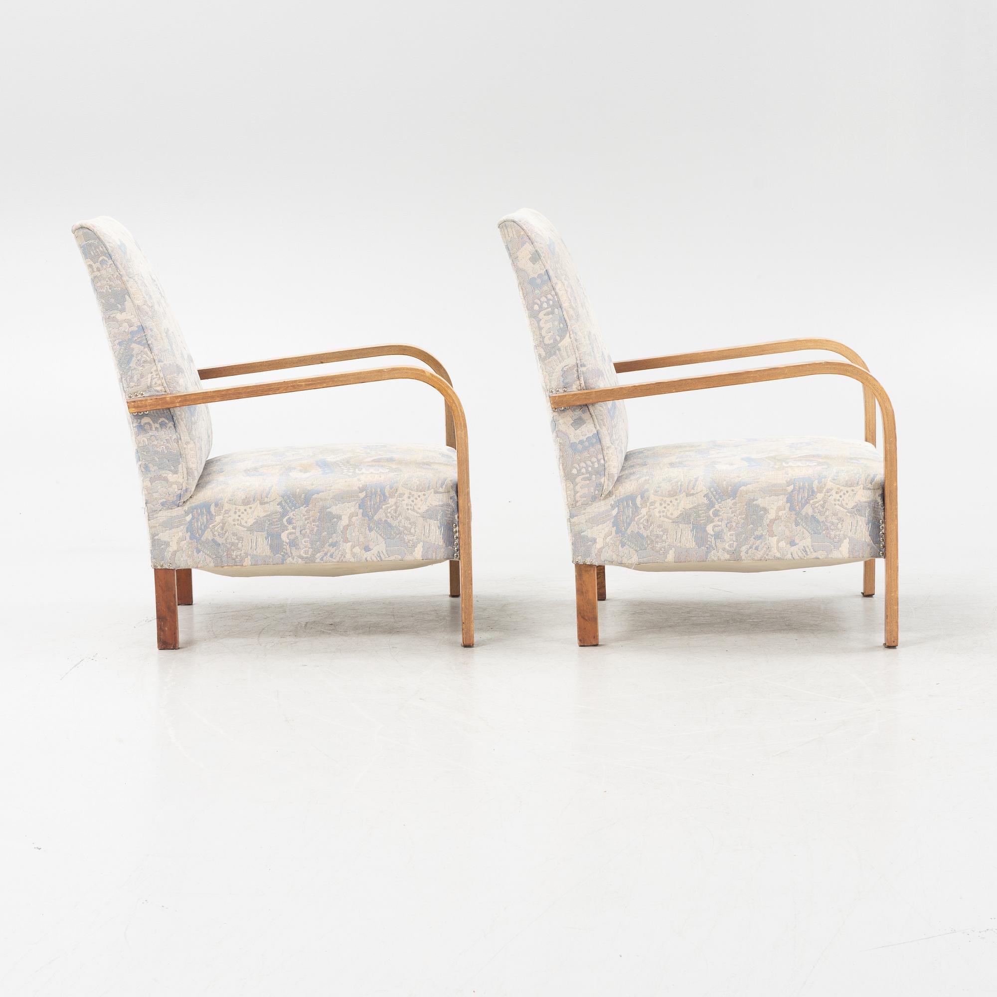 A pair of 1930's armchairs.