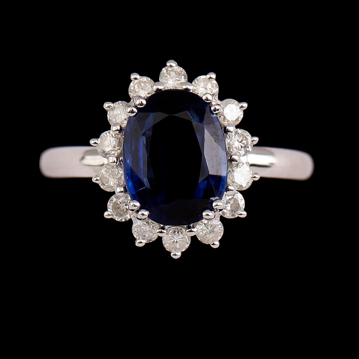 RING, 18 k guld, blå kyanit ca 3.05 ct, 14 briljantslipade diamanter tot ca 0.48 ct.