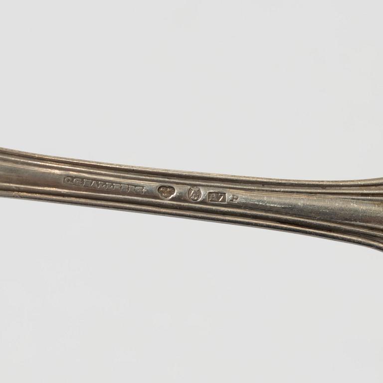 Skedar, 23 st, silver, "Olga", CG Hallberg, Stockholm 1910.