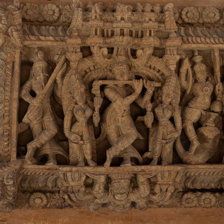 A carved wooden panel, India, circa 1900.