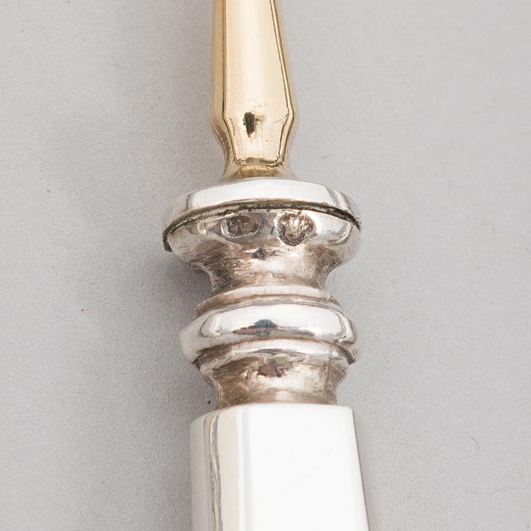 A 42-piece set of silver cutlery with seashell decorated handles, Finnish hallmarks, 1918-1950.