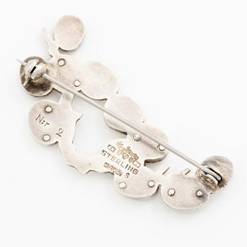 Wiwen Nilsson, brosch i form av kvist, sterlingsilver, Lund 1954.