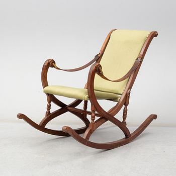 a late 19th century rocking chair.