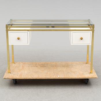 A 1980's dressing table with glasstop.