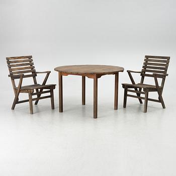 Carl Malmsten, garden furniture, a table and two armchairs. "Bergshamra", second half of the 20th century.