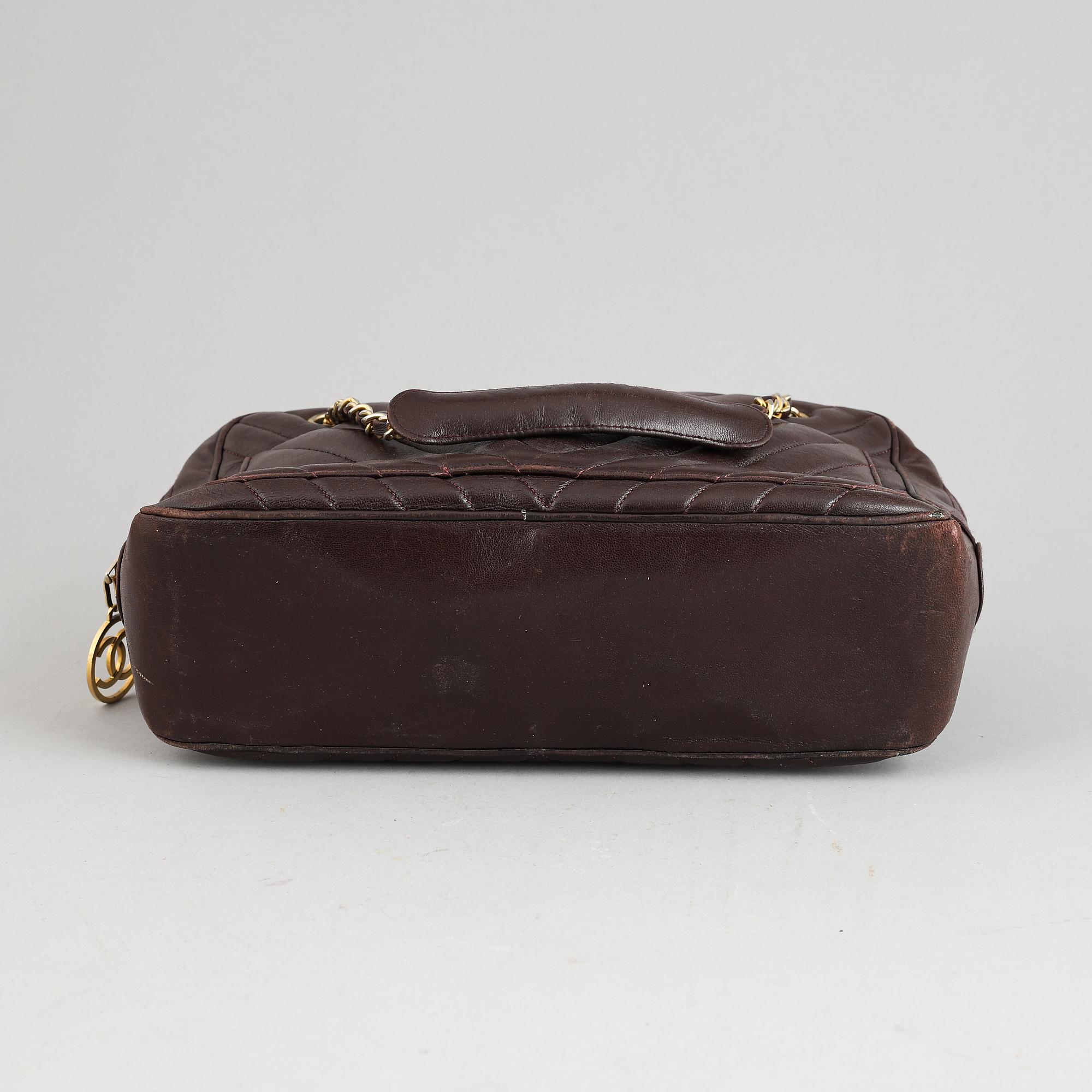 Chanel, a burgundy leather handbag, 1989-91.
