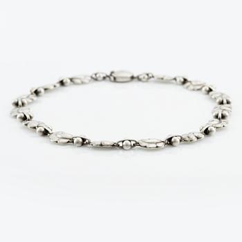Harald Nielsen, a sterling silver necklace, a brooch, and a pair of earrings, for Georg Jensen, Denmark post 1945.