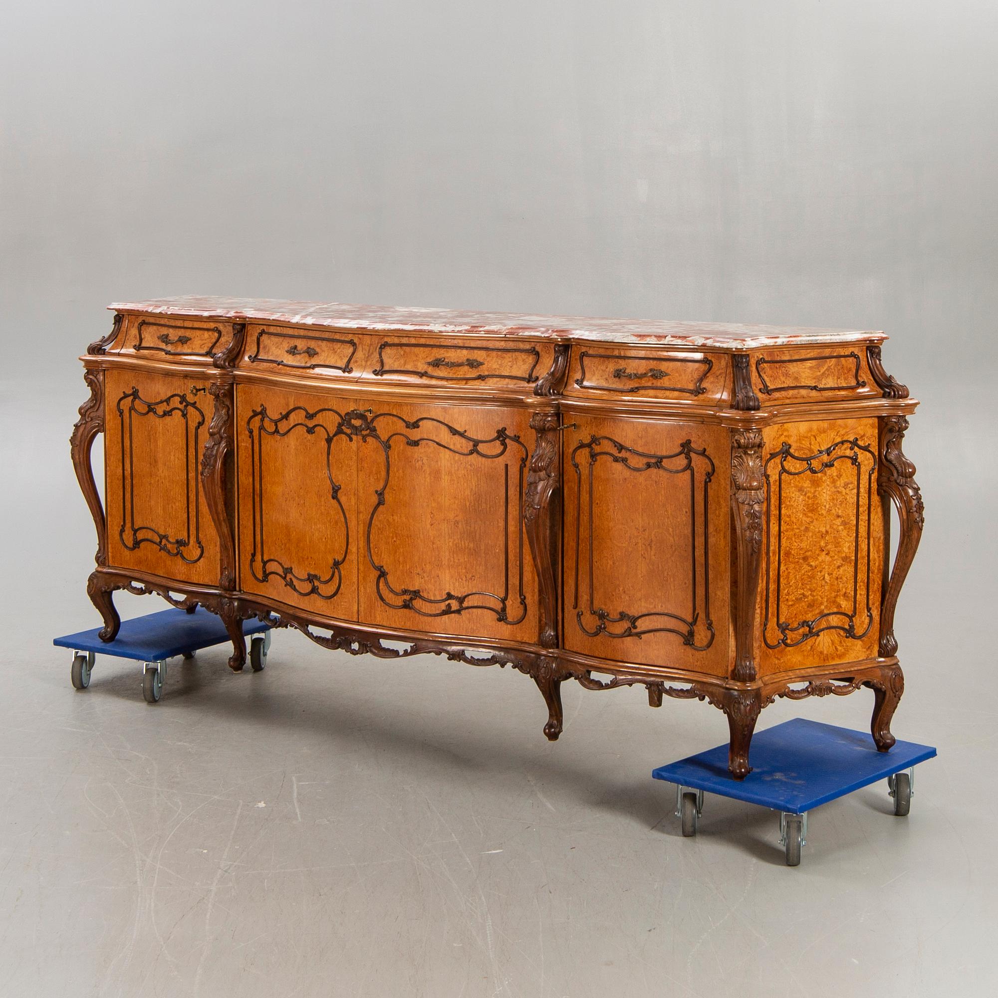 A Louis XV style birch sideboard first half of the 20th century.
