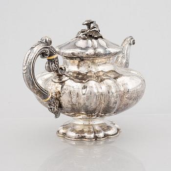 A Swedish Silver Rococo-Revival Teapot, mark of Gustaf Teodor Folcker, Stockholm 1852.