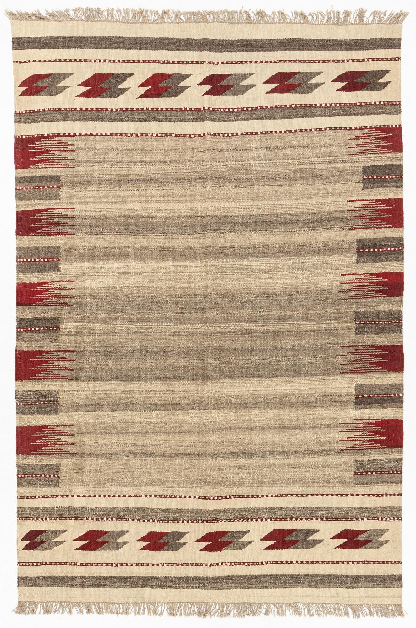 A Persian Kilim carpet, c. 288 x 195 cm.