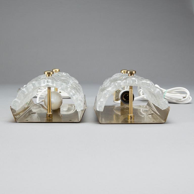 CARL FAGERLUND, a pair of glass and brass Orrefors wall lamps.