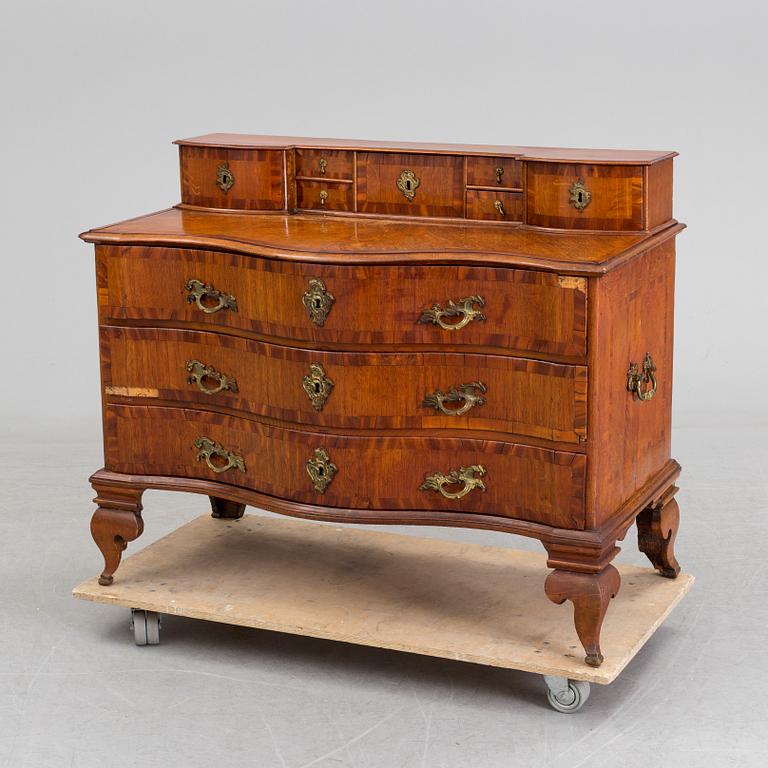 An 18th century chest of drawers.