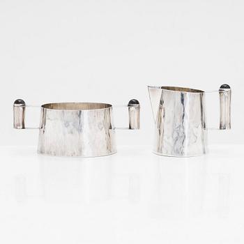 Rauni Mustonen, a silver sugar bowl and cream jug with cut stones, Helsinki 1981.