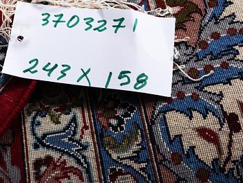 An Isfahan rug, a. 243 x 158 cm.