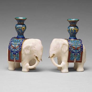 670. A pair of cloisonné and marble elephant candle holders, late Qing dynasty, about 1900.