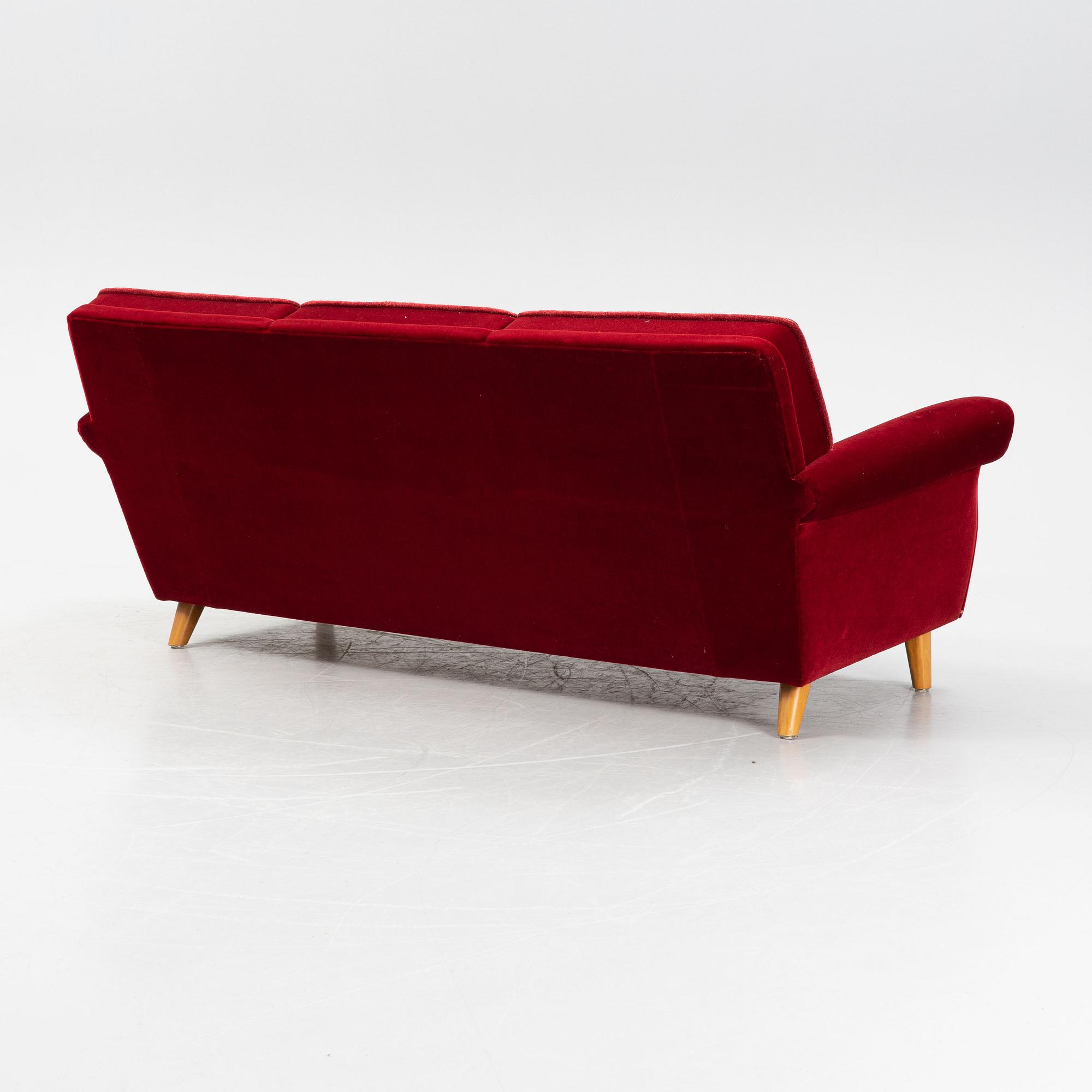 A velvet upholstered sofa, mid 20th Century.