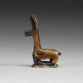 1291. An Ordo bronze figure of a reclining deer, Warring States (481 BC-221 BC).