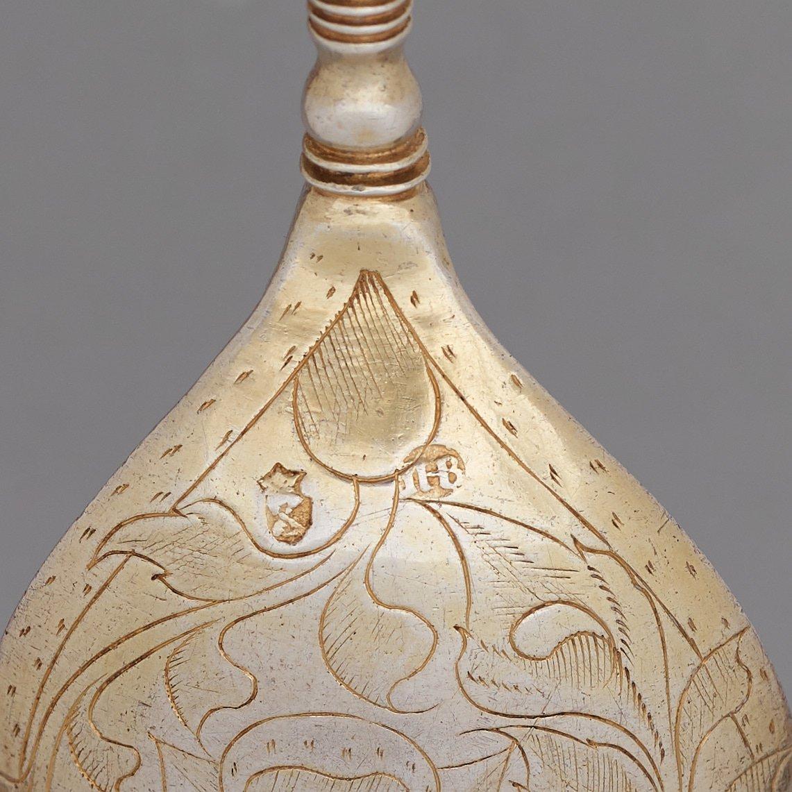 Jöran Hieronymi Bernegau, sked med dubbel kerubknopp, förgyllt silver, Norrköping, (verksam -1648-1679).