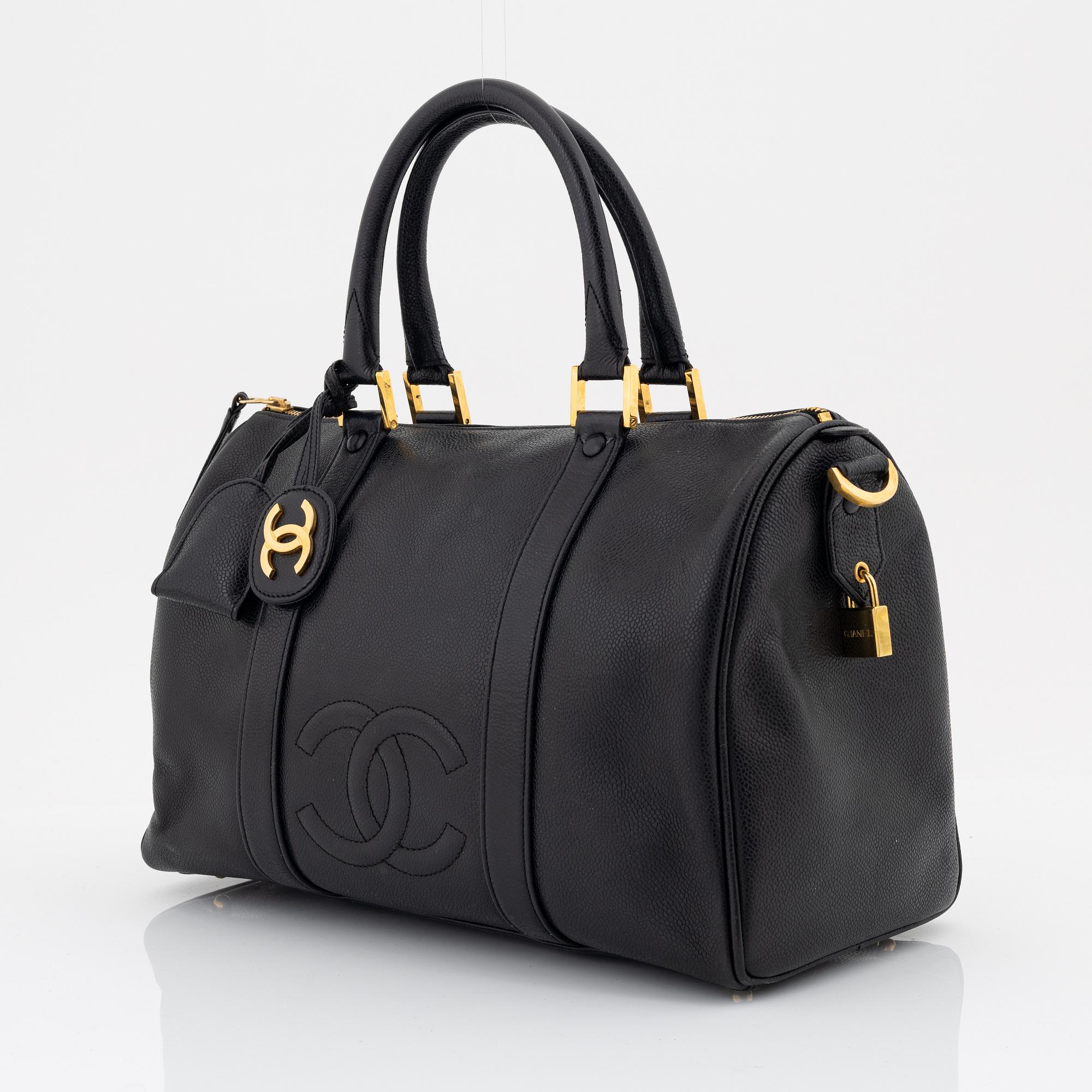Chanel, a black caviar leather 'Boston bag'.