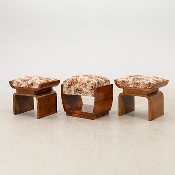 A pair of stools and an Art Deco from the first half of the 20th century.