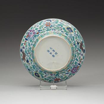 A doucai dish, Qing dynasty, with Tongzhis six character mark and period (1862-74).