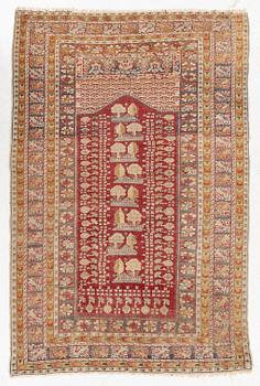 An oriental carpet, c. 195 x 70 cm.