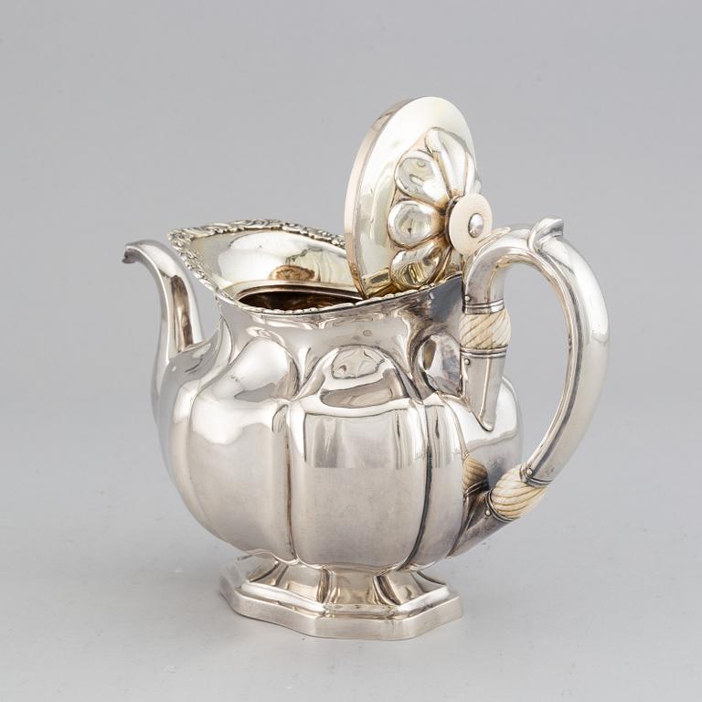 A Russian 19th century parcel-gilt silver tea-pot, mark of Adolf Sper, St. Petersburg 1837.