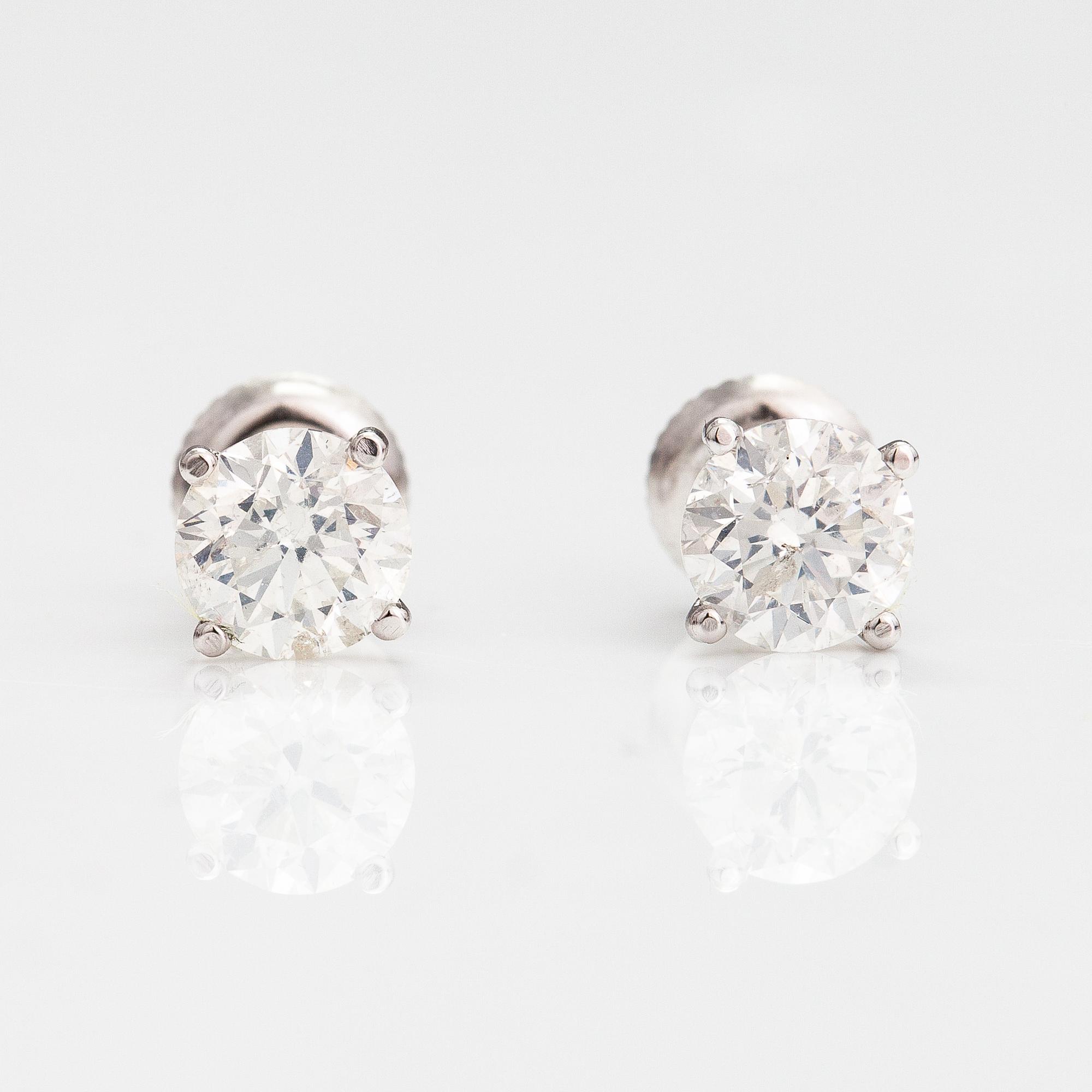 A pair of 14K white gold earrings with brilliant cut diamonds ca. 1.70 ct in total.