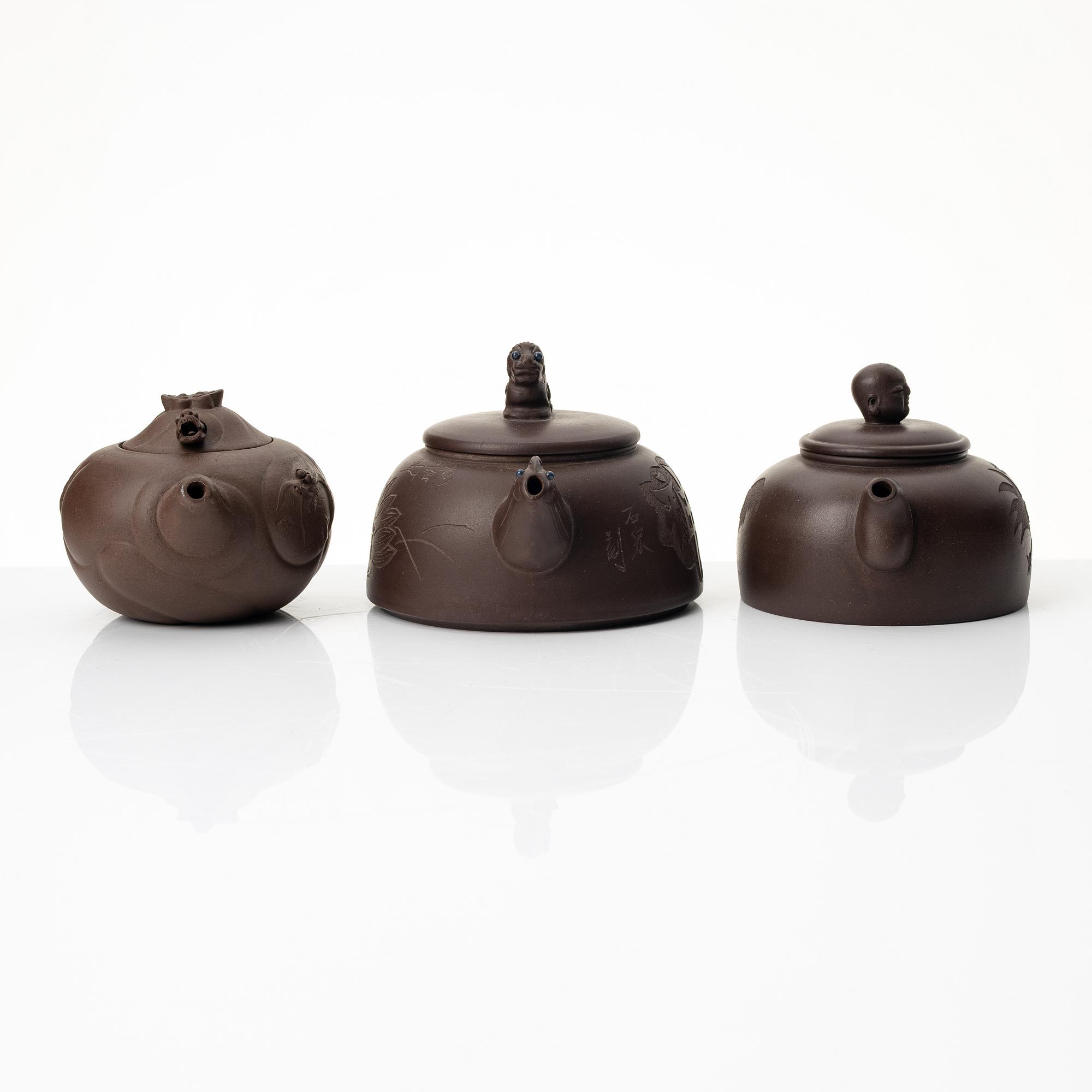 A group of three Chinese yixing teapots, 1980s.