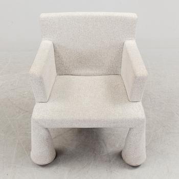 a "V.I.P. chair" by Marcel Wanders for Moooi, deigned in 2000.