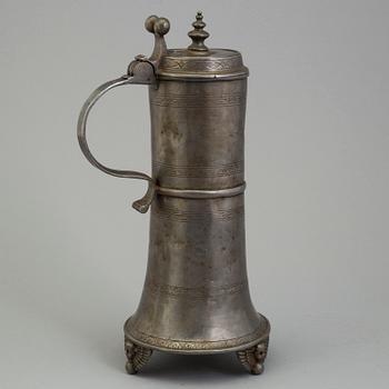 A PEWTER MUG, dated 1776.