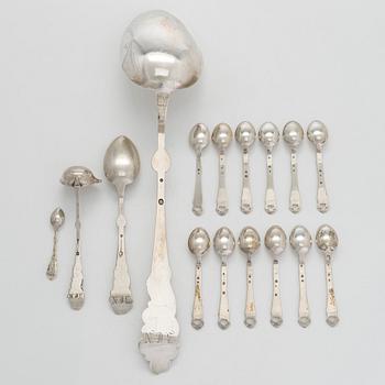 A set of  four silver serving spoons, with a set of 12 coffee spoons, Denmark, early and first half of the 20th century.