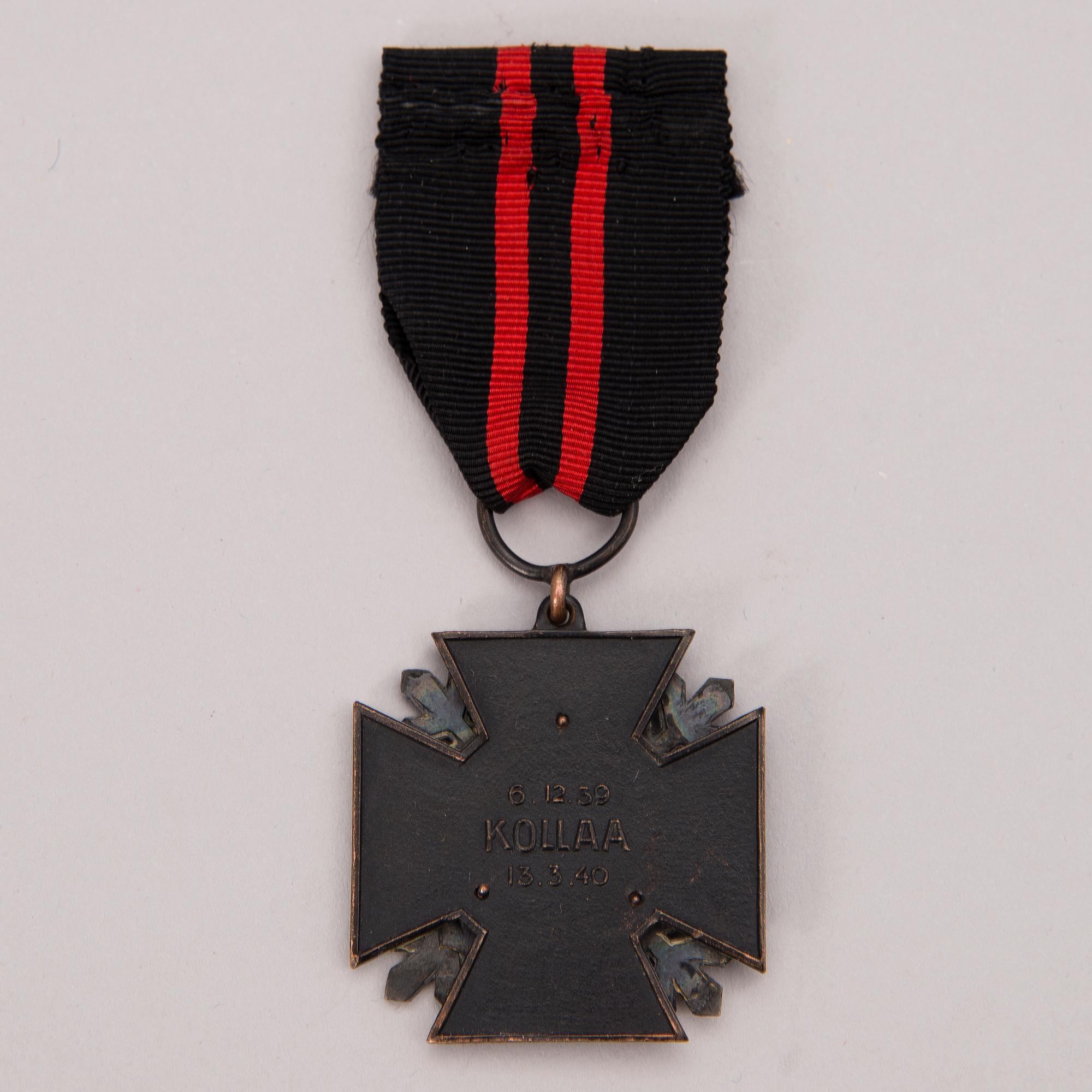 A mid 20th Century Finnish Kollaa commemorative cross.